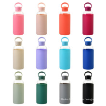 Hot selling2021 600ml glass water bottle with silicon Lid and Silicone Sleeve eco friendly recycled glass juice milk bottle